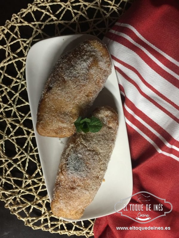 Sacamos del fuego y pasamos por azúcar.