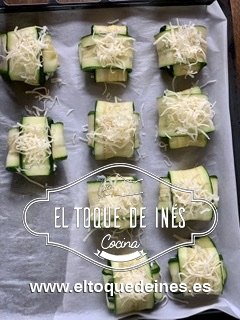 Repartimos un poco de queso rallado por encima.